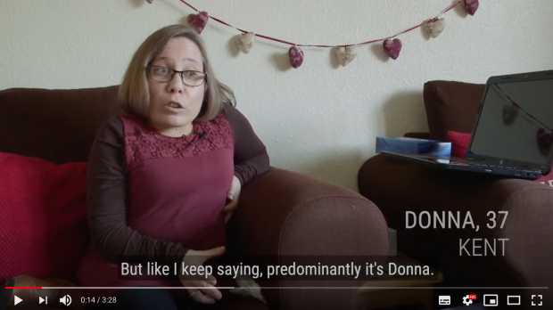 A screenshot from Donna's film showing Donna talking on her sofa.